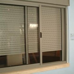 שלומי טבת - תיקון תריסי גלילה