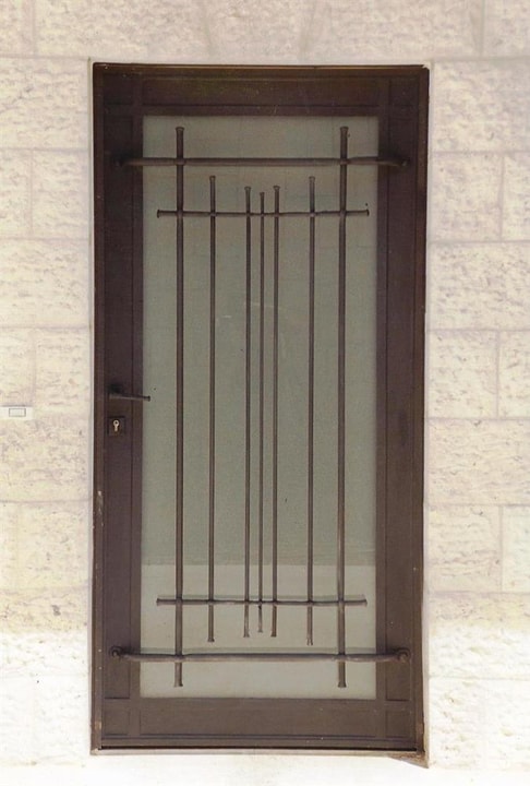 רוםסן - אומנות הפרופיל הבלגי דלת בלגית ברזל משולבת נפחות קלאסית וזכוכית מעכבת פריצה  